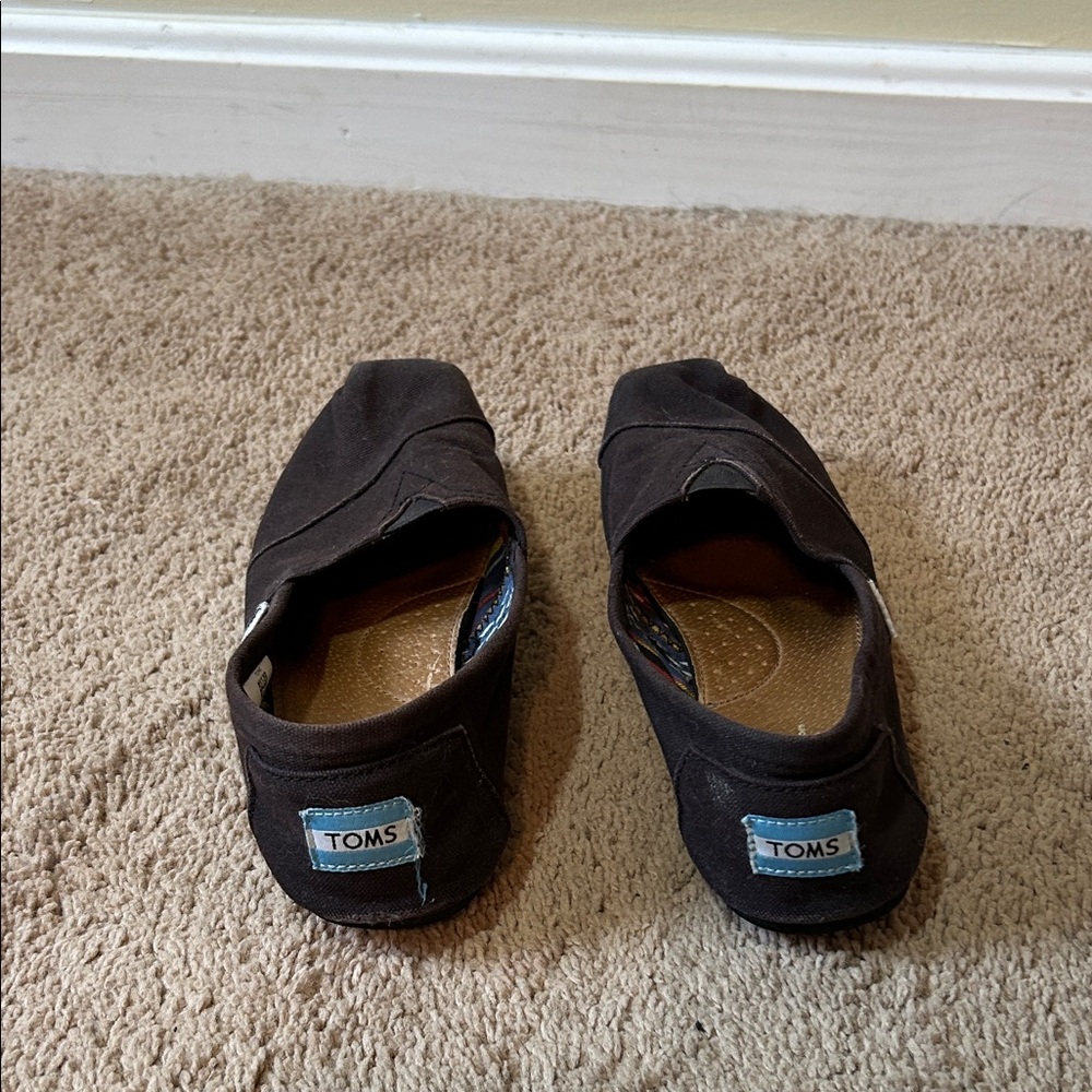 TOMS Women’s  Black  Slip-On Loafers